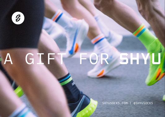 Runners wearing colorful SHYU socks | SHYU