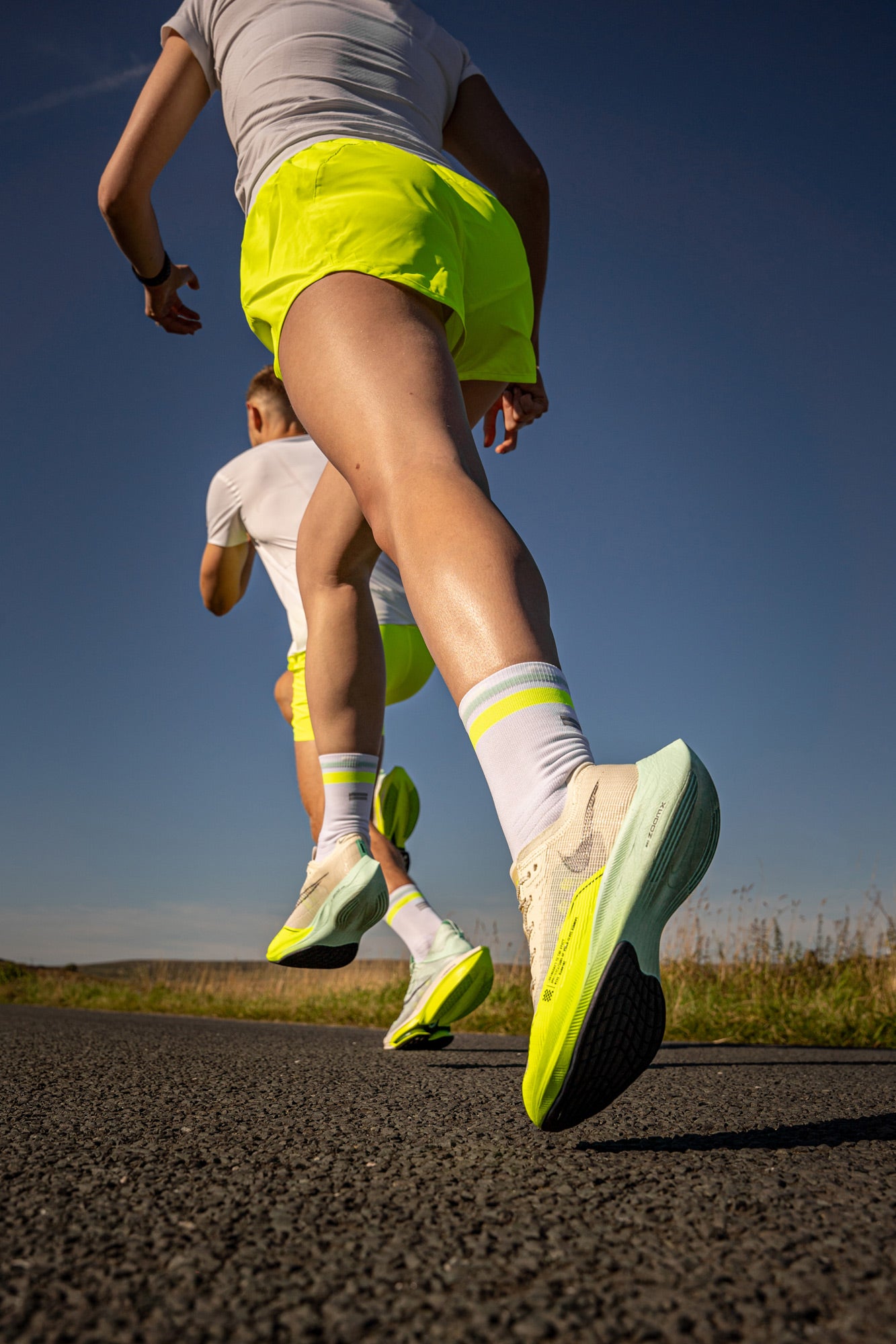 Nike mint running socks on runners